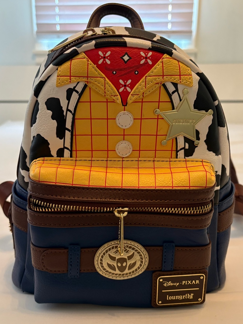 Loungefly Woody Cow Print Mini Backpack - Yellow/Blue/Brown/Black/White